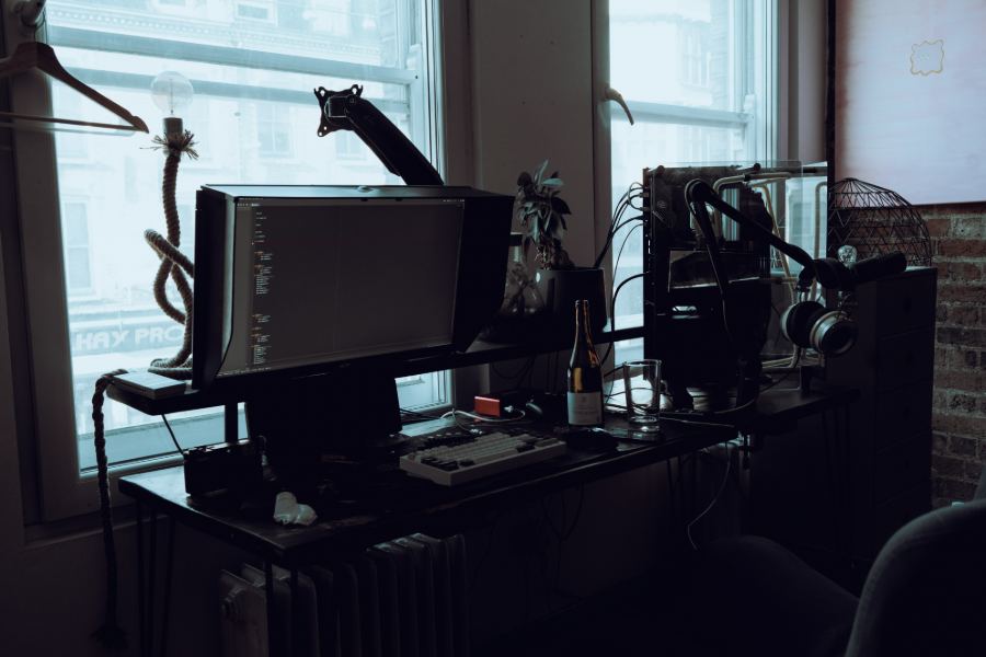 Wide desk, window, rope, wine bottle