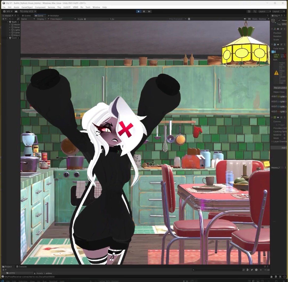Etty in the Unity shell ; kitchen interior, hands raised, captured from the game view of the in-development runtime