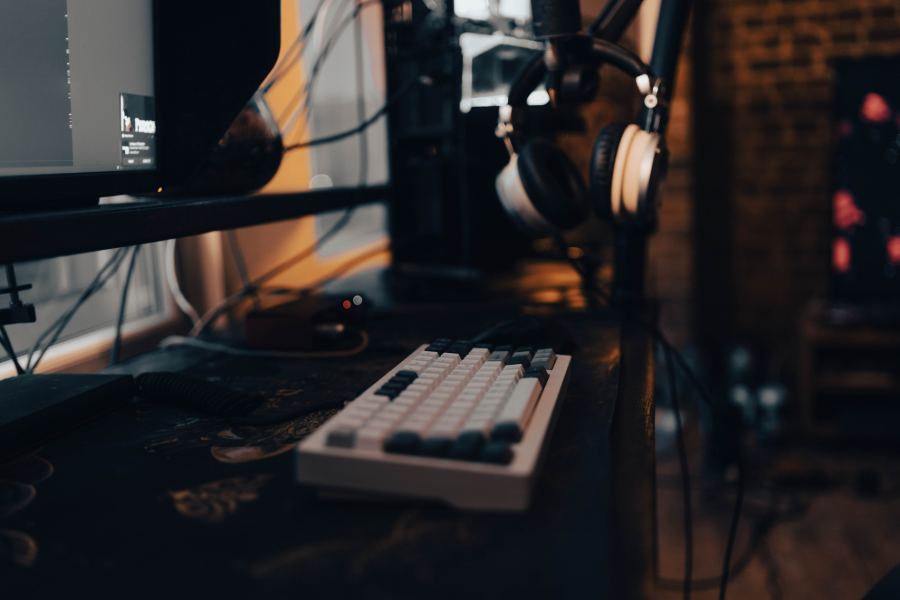 Keyboard with headphones, desk-level