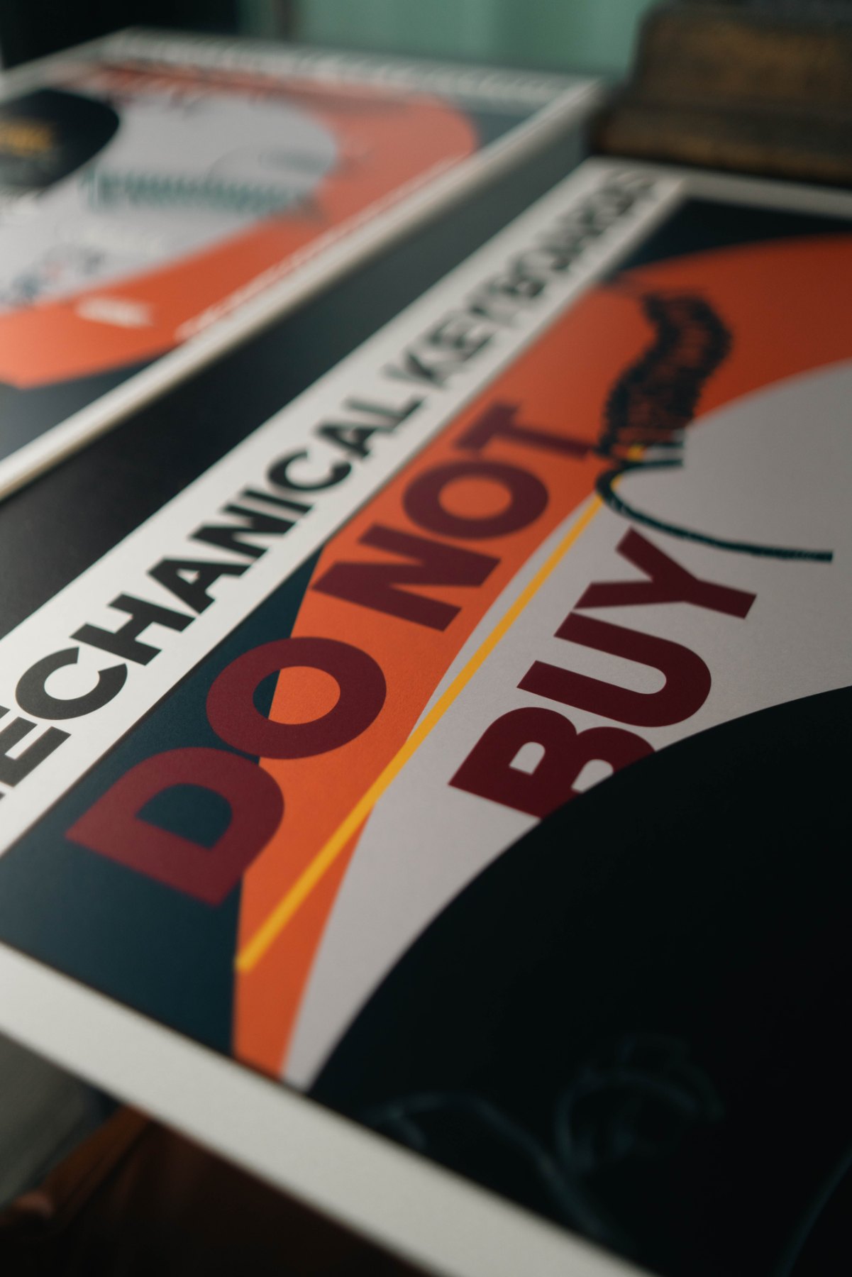 Raking-light close-up of the DO NOT BUY type, with the yellow underline rule